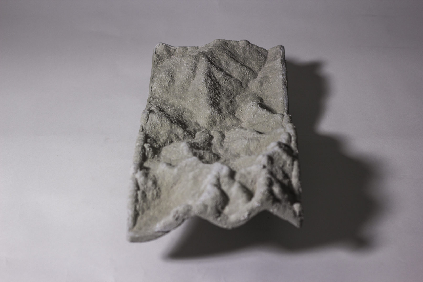 YARLUNG TSANGPO RIVER BENDS AROUND SMALL MOUNTAIN ADJACENT DALIN VILLAGE