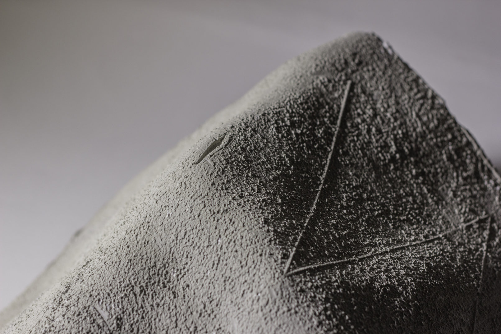 LAST LEG OF TRAIL DIVES BELOW GROUND, ARRIVING AT MUSEUM EMBEDDED IN RIDGE